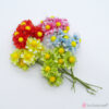 Υφασμάτινα λουλούδια σε διάφορα χρώματα