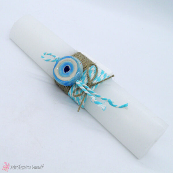 λευκή οβάλ λαμπάδα με μπλε κεραμικό μάτι