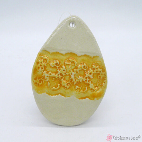 Λευκό κεραμικό αυγό με κίτρινη δαντέλα
