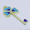 Χρυσό μεταλλικό κλειδί με γαλάζιο και μπλε σμάλτο