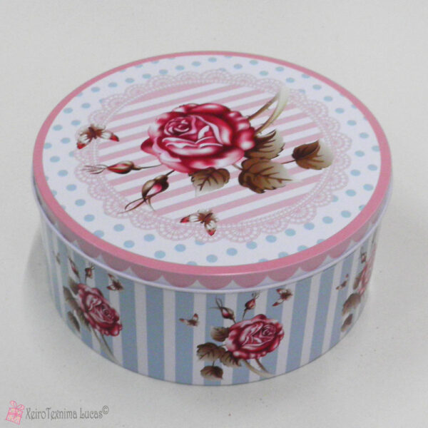 Στρογγυλό μεταλλικό κουτί με ροζ τριαντάφυλλο