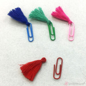Χρωματιστοί συνδετήρες με πολύχρωμα φουντάκια