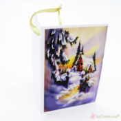 χριστουγεννιάτικη κάρτα με έλατο και σπιτάκι σε χιονισμένο τοπίο