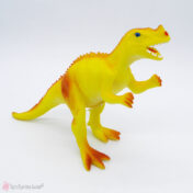 Παιχνίδι δεινόσαυρος σε κίτρινο χρώμα