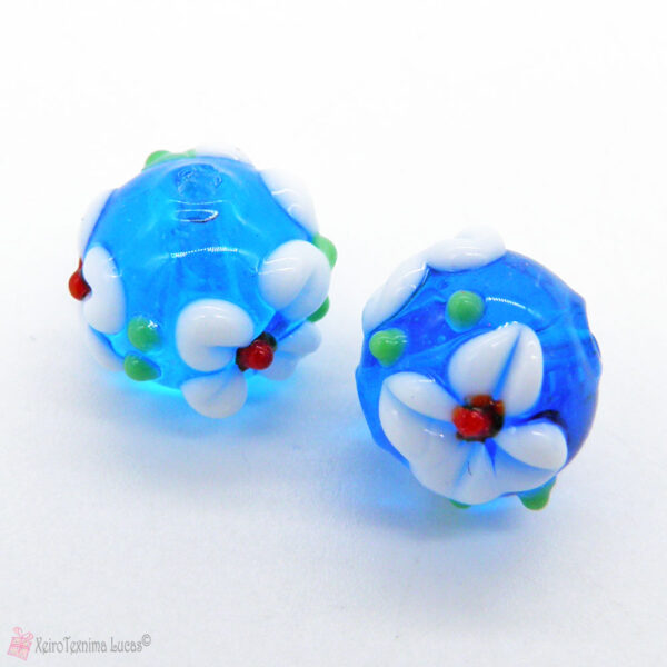 Μπλε χάντρες 12mm με ανάγλυφο λουλούδι